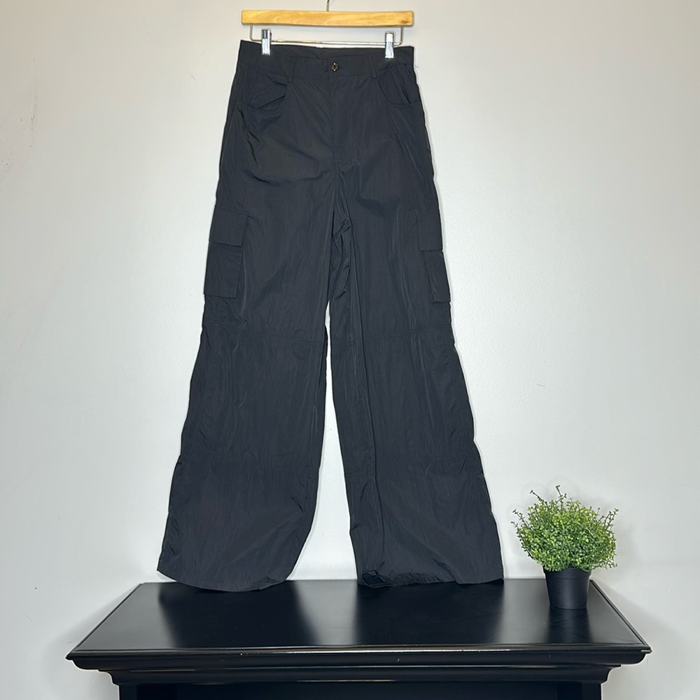 Black parachute pants by Daisy Street.